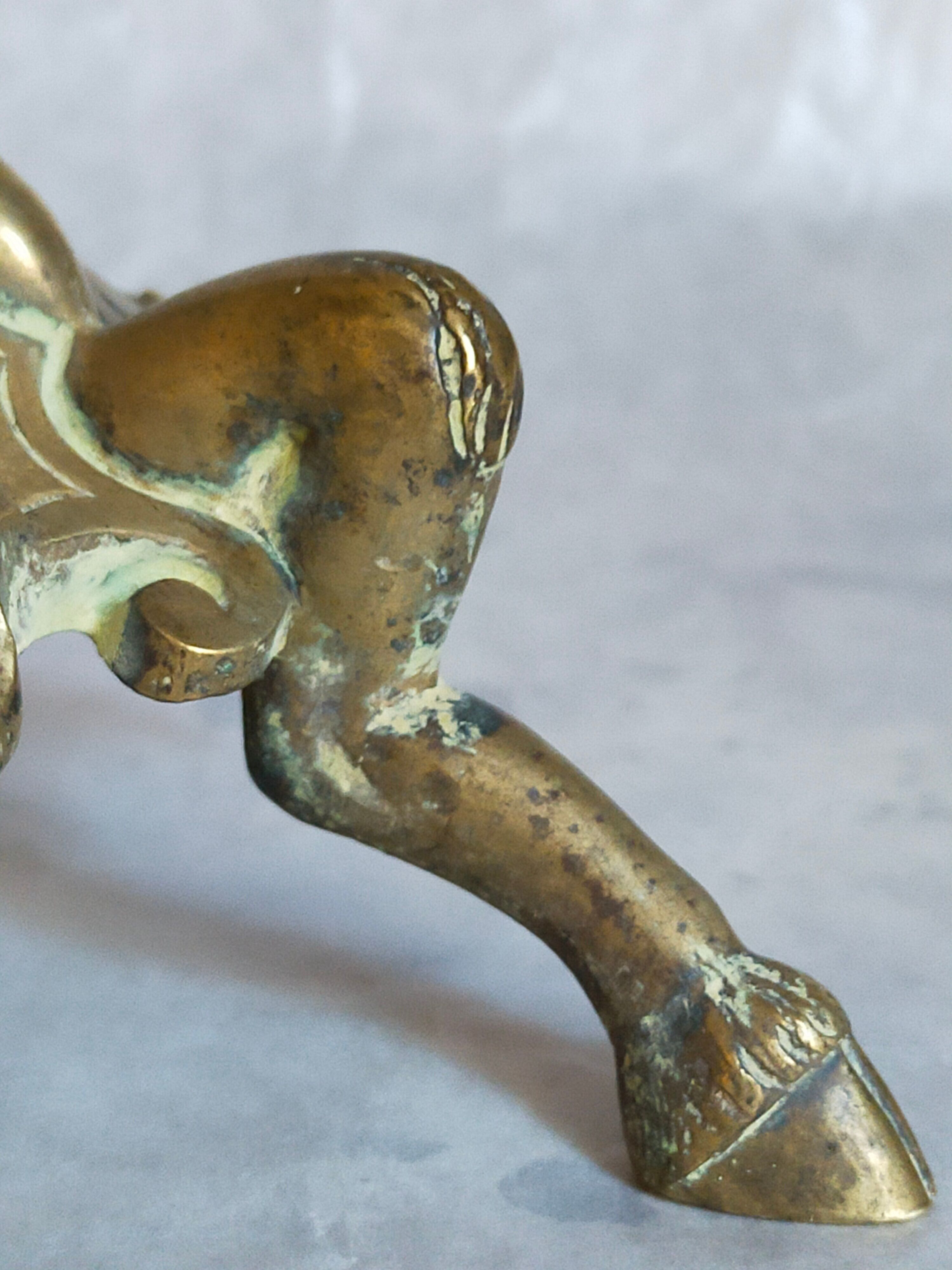 Candle holder in gilded bronze tripod XIXth century