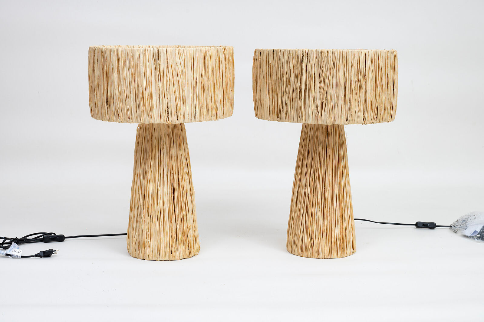 Handmade pair of natural rafia table lamps