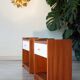 Pair of bedside tables, mahogany, white laminate and brass, 1970