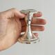Set of 2 vintage silver-plated metal candle holders.