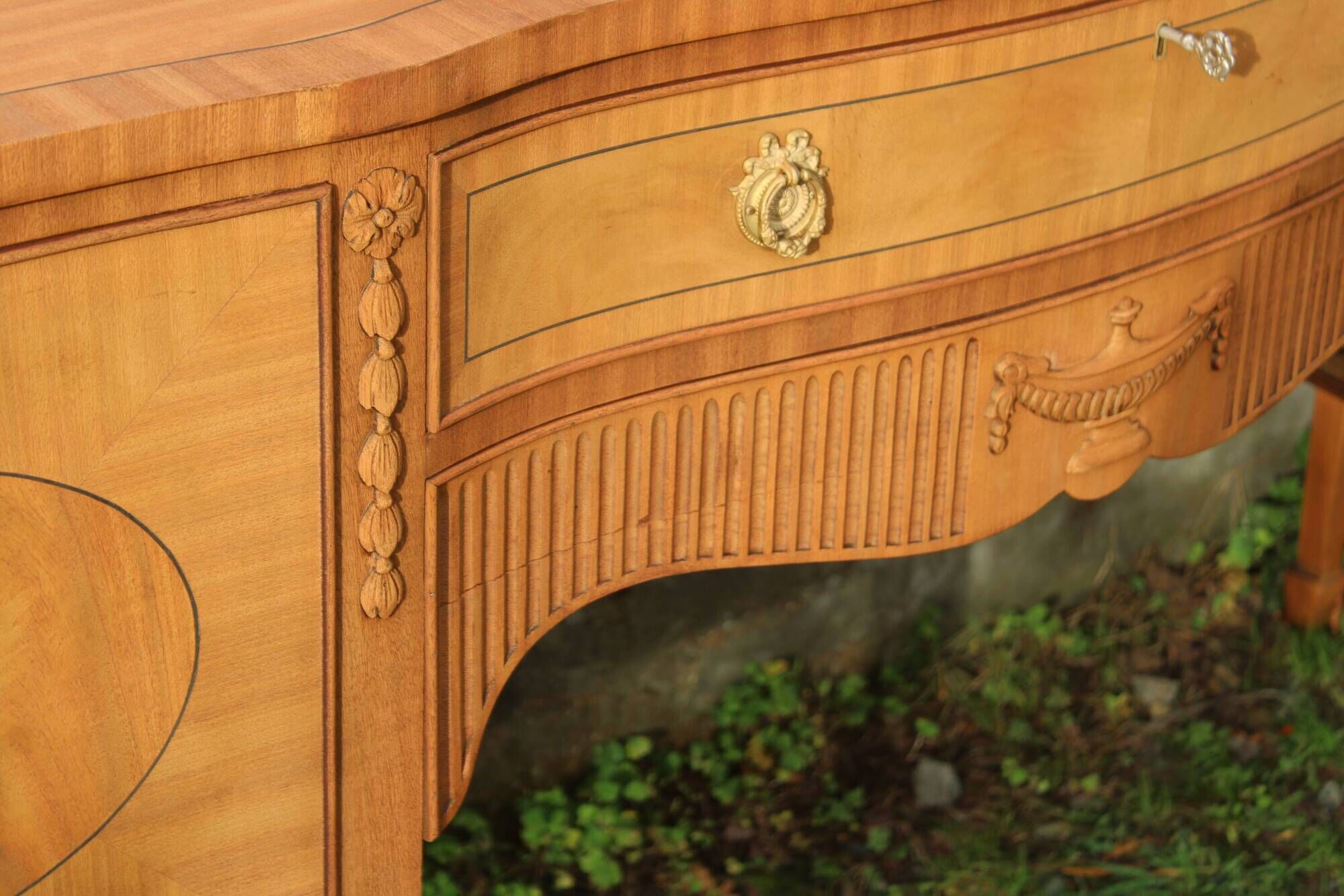 English-made enfilade in Louis XVI style with light wood veneers.