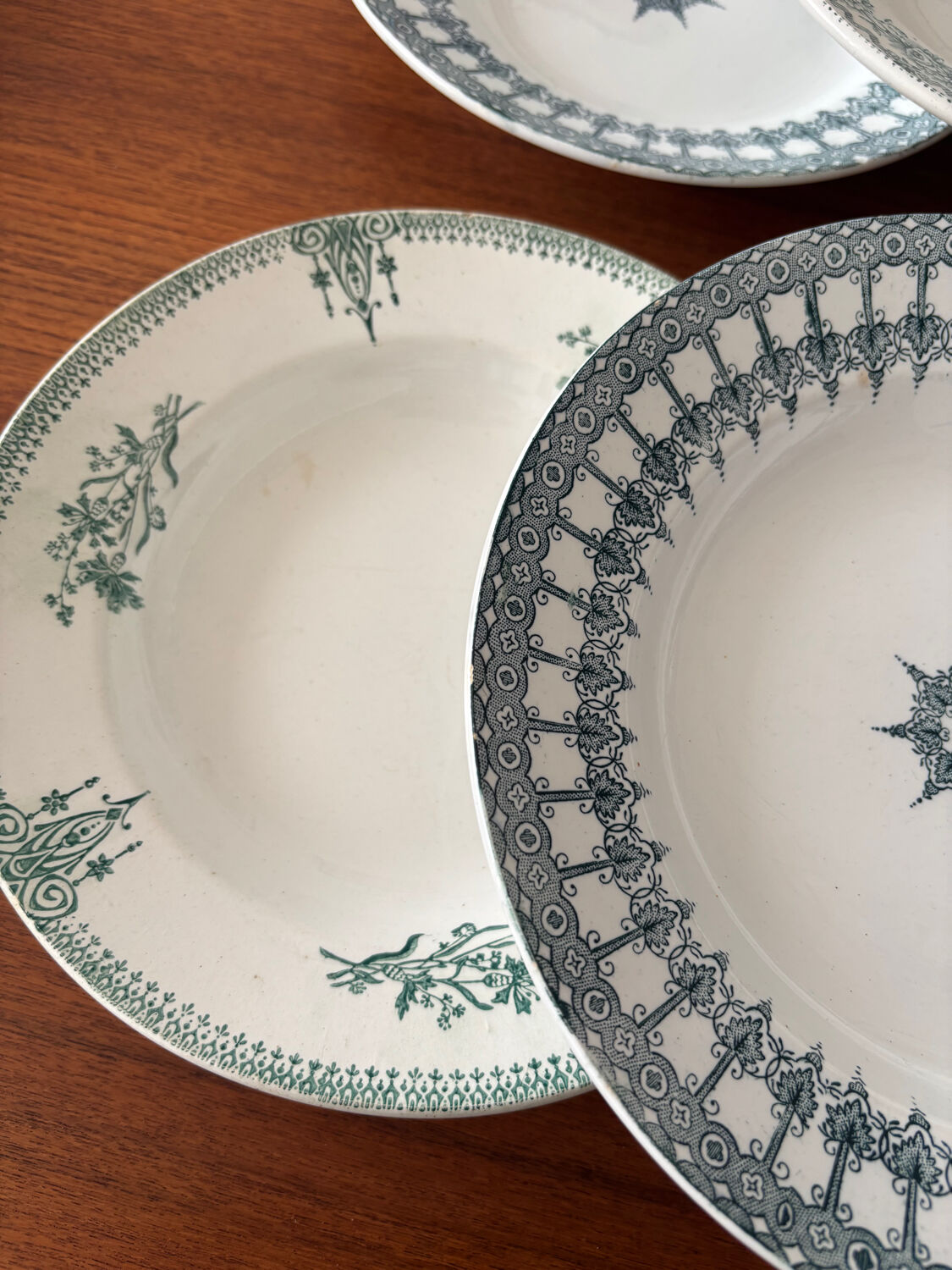 A deep plate in blue and green ironstone, antique French earthenware.