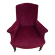 Blackened wooden bergère on wheels, Napoleon III period, upholstered in velvet.
