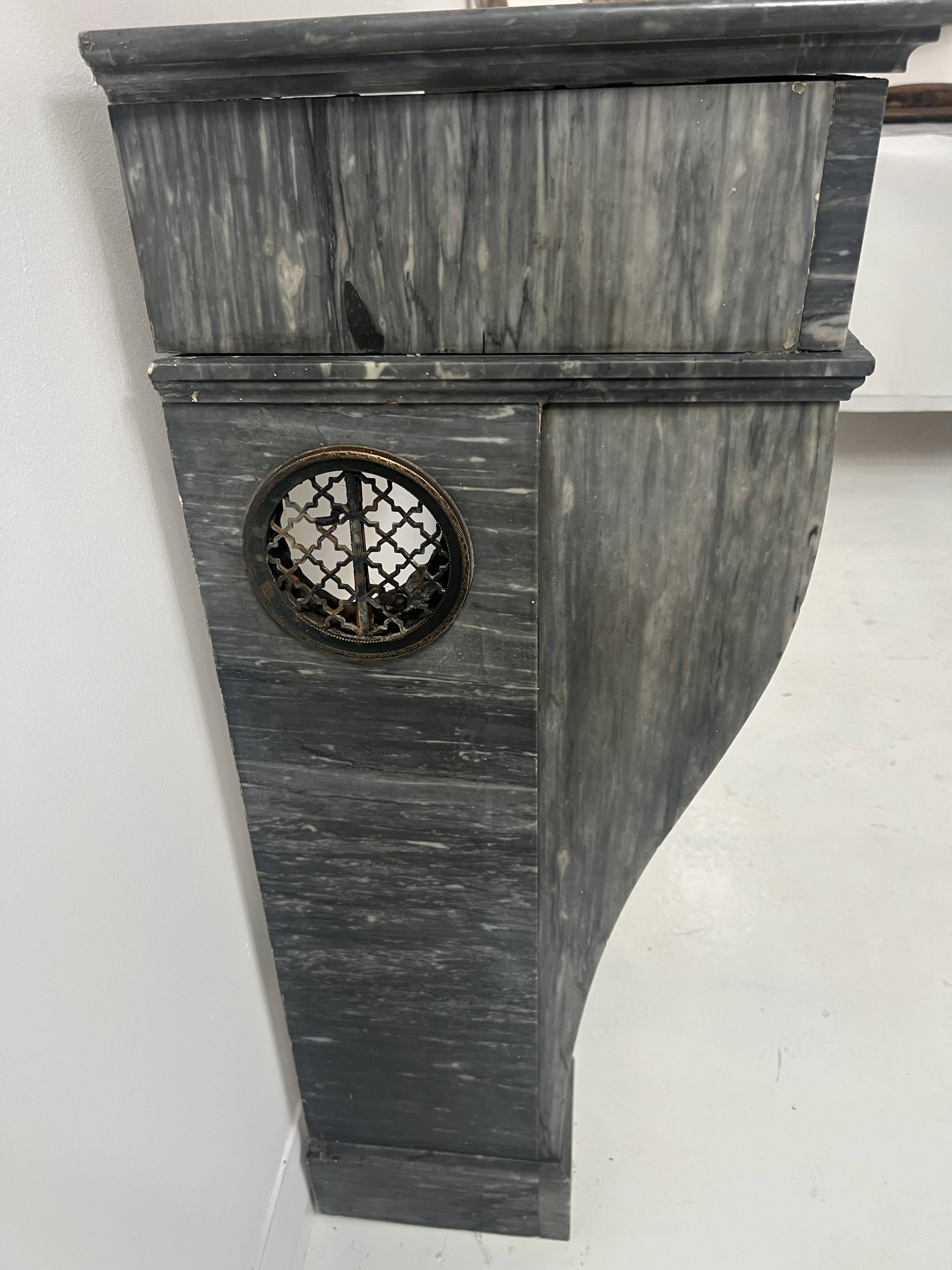Napoleon III fireplace in blue Turquin marble from the 19th century.