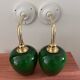Paire d’appliques murales en opaline verte