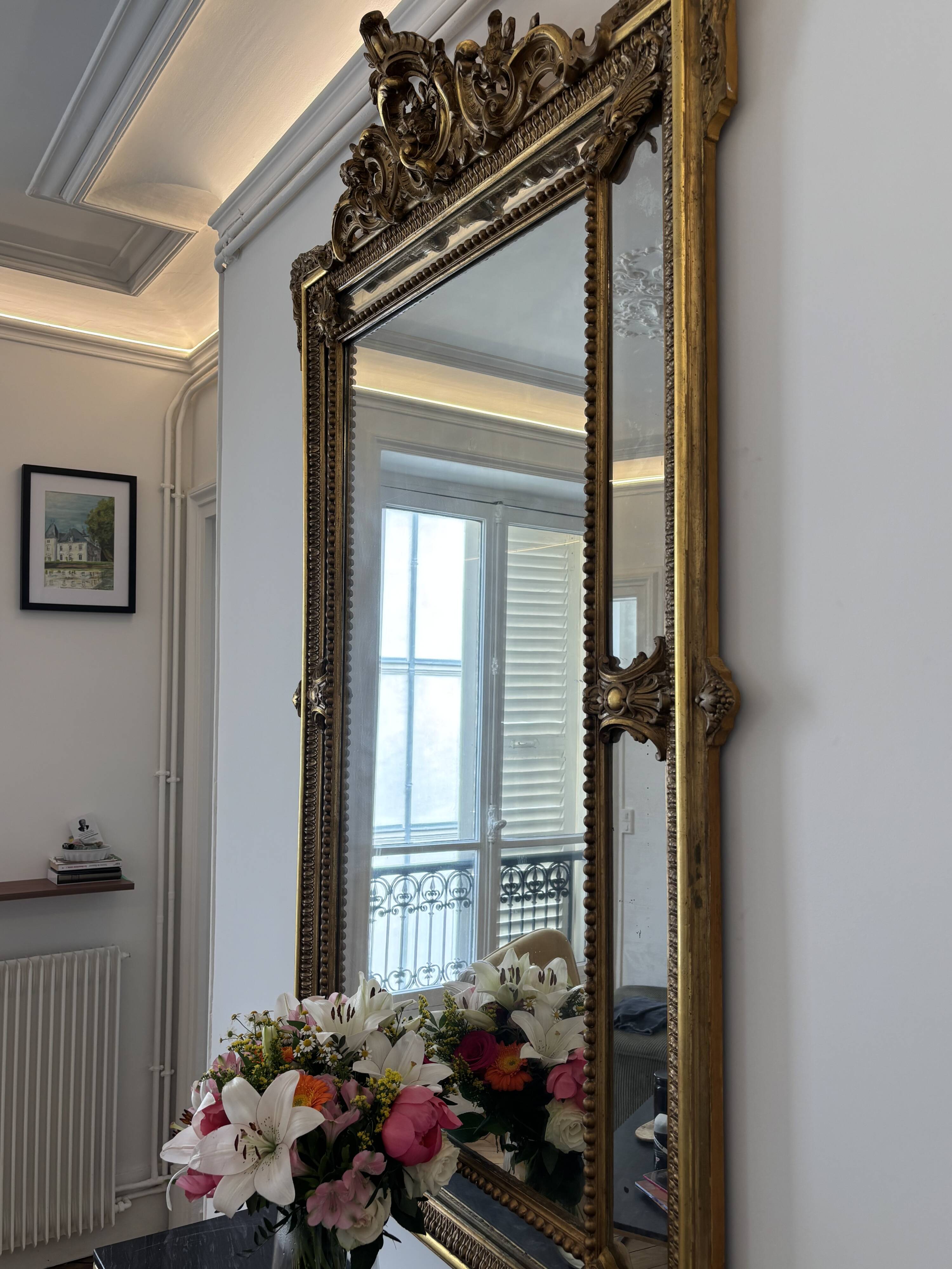Louis XV style mirror with moulded gilded wood and stucco from the Napoleonic III era.