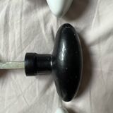 Porcelain and brass door knob