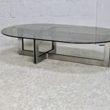 Coffee table with steel base and smoked glass slab. Circa 197