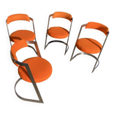 Four stainless steel armchairs from the 70s