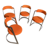 Quatre fauteuils inox des années 70