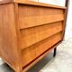 Modernist chest of drawers with slanted drawers