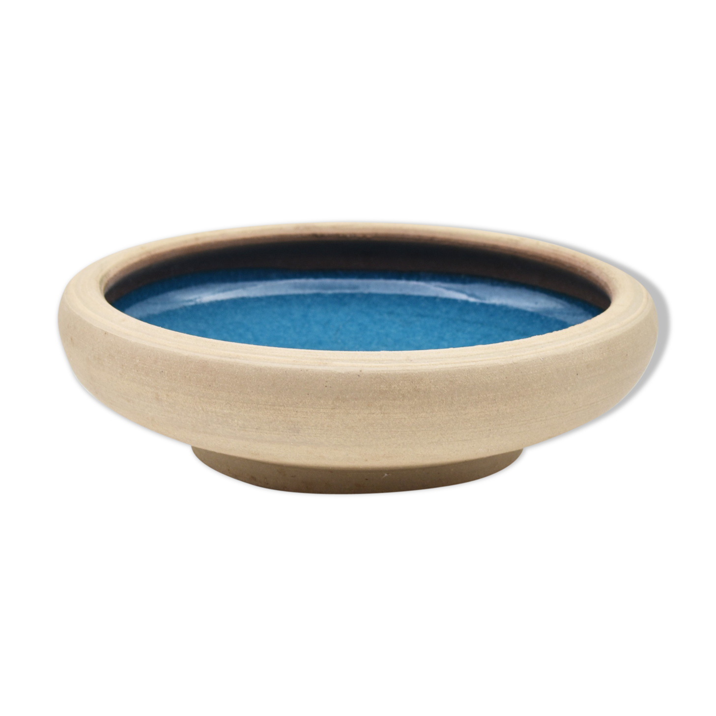 Blue enamelled sandstone cup