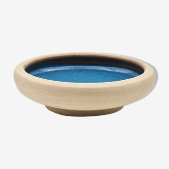 Blue enamelled sandstone cup