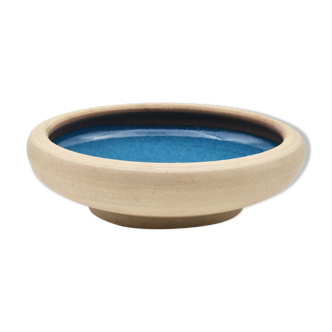 Blue enamelled sandstone cup