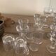 Set of 21 small liqueur glasses and 16 small cups and ramekins.