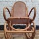 Vintage rocking chair in rattan and cane.