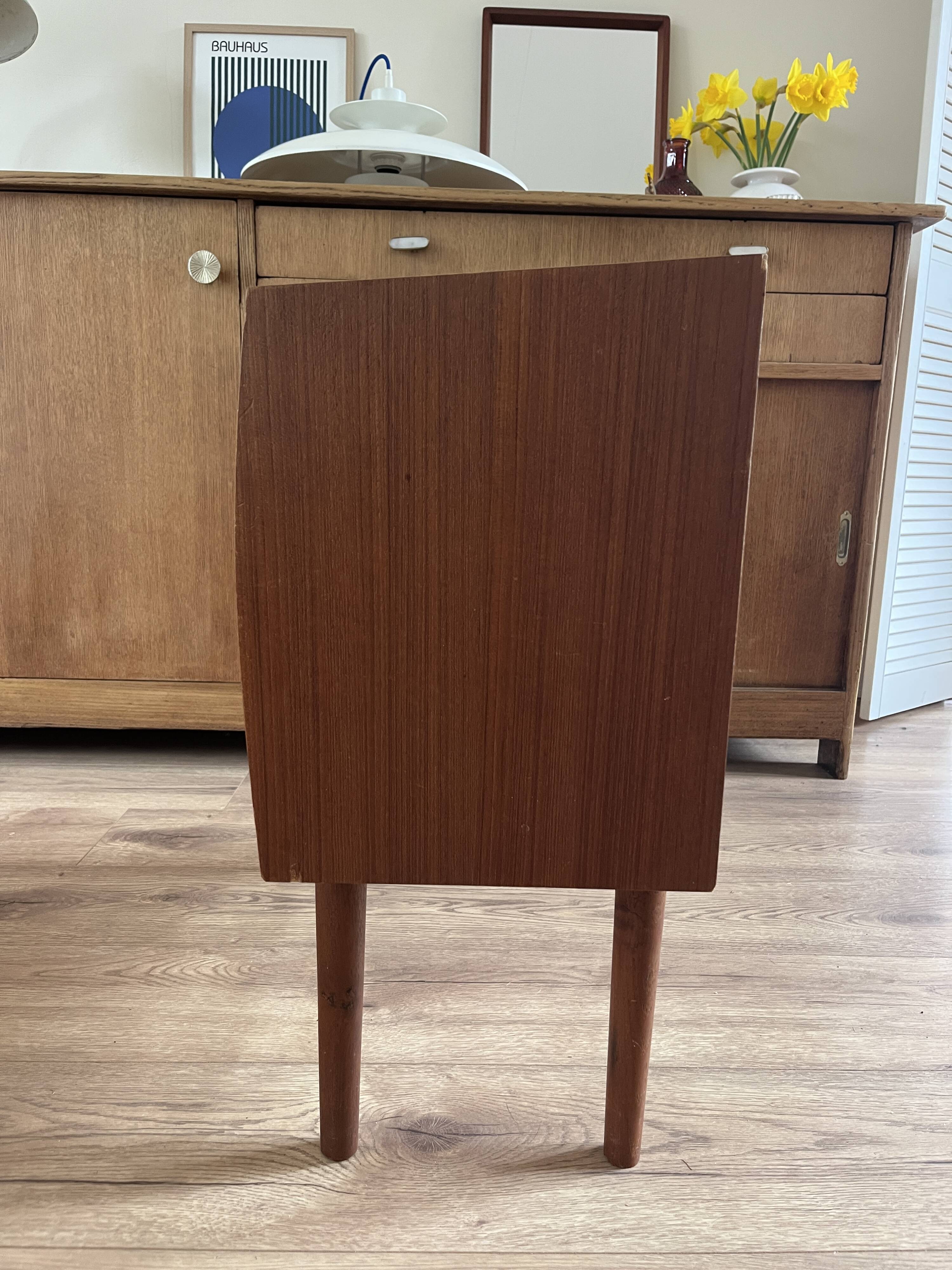 Vintage Danish teak commode with beautiful handles.