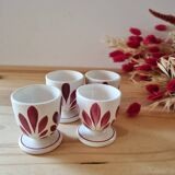 Set of four Digoin-style egg cups