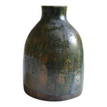 Vase en céramique signature au poisson à identifier