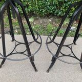 Pair of vintage metal and leather bar stools
