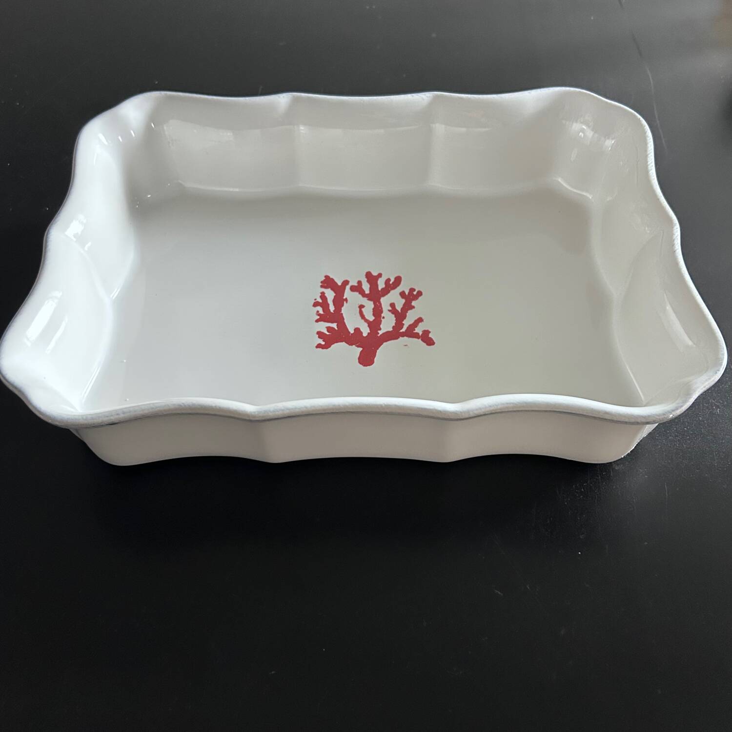 Provençal dish with coral decoration