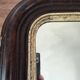 Louis-Philippe mirror in old wood and patinated gilded surround