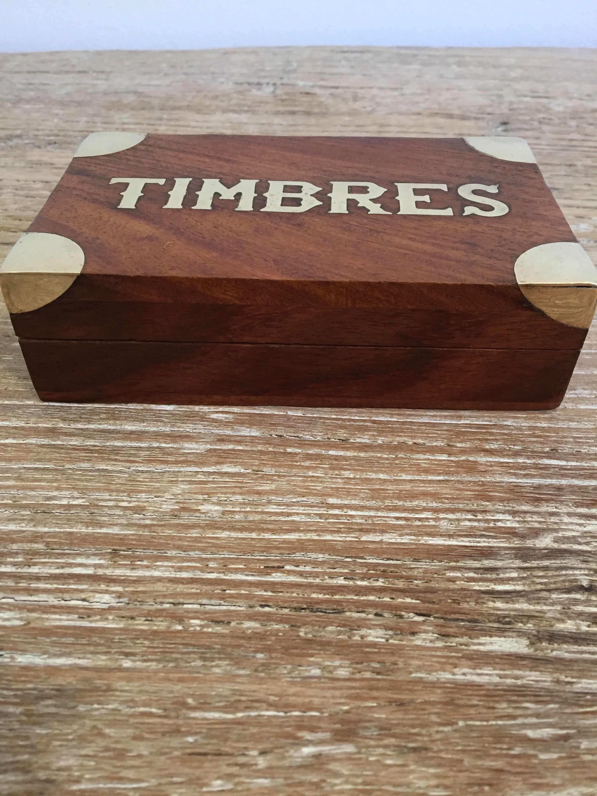 Small cabinet in walnut and brass