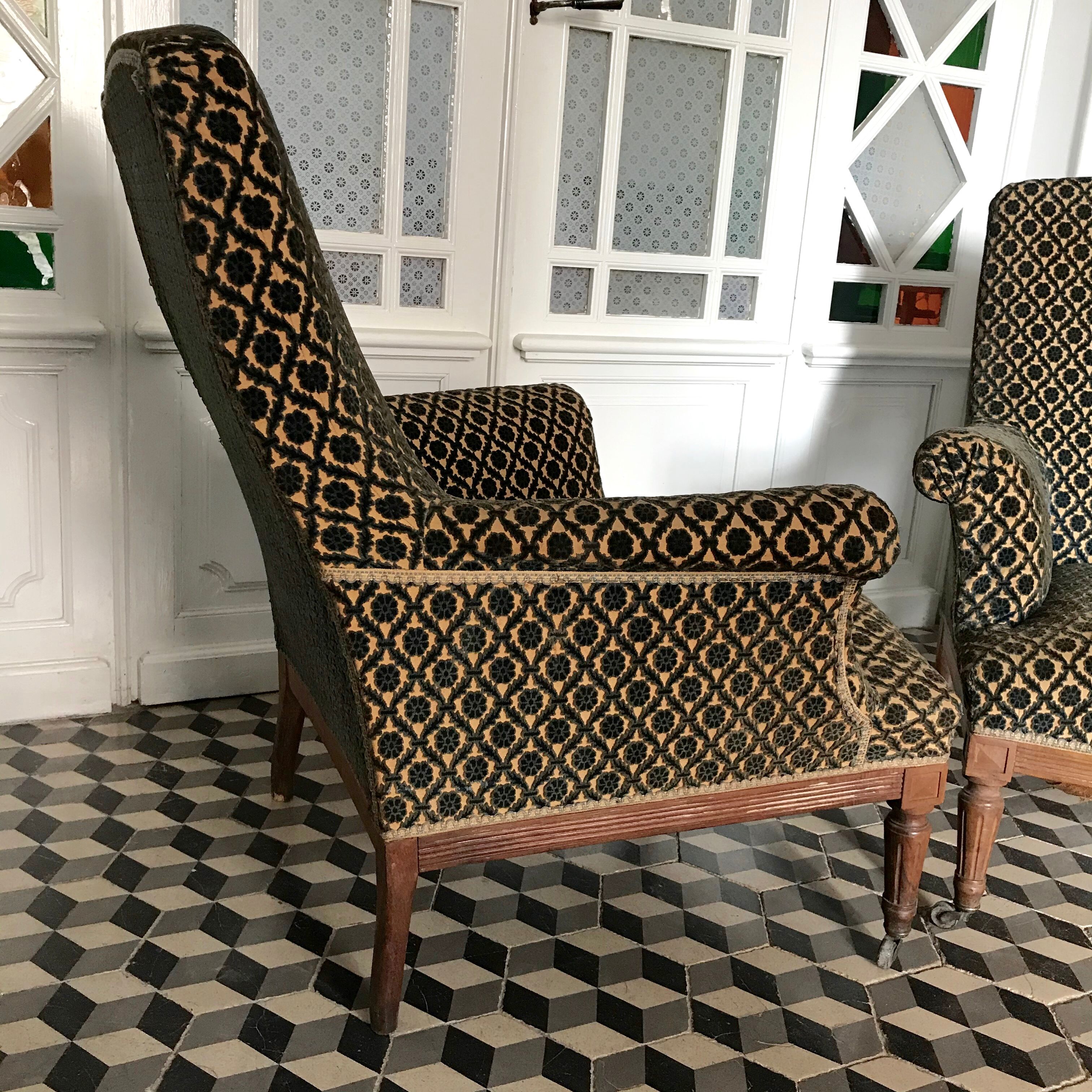 Vintage armchairs and rests feet