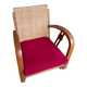 Old low colonial Art Deco style wooden armchair.