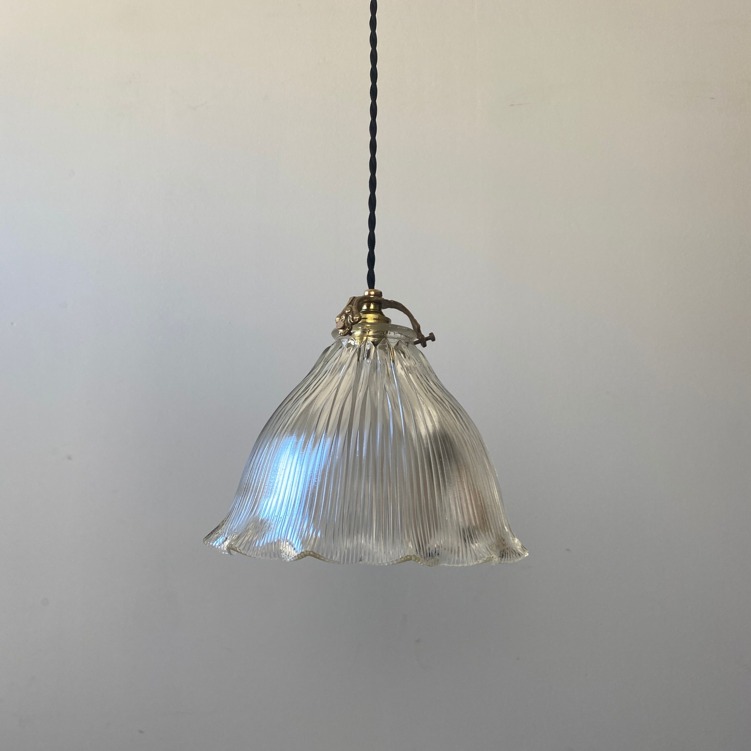Old vintage holophane glass suspension