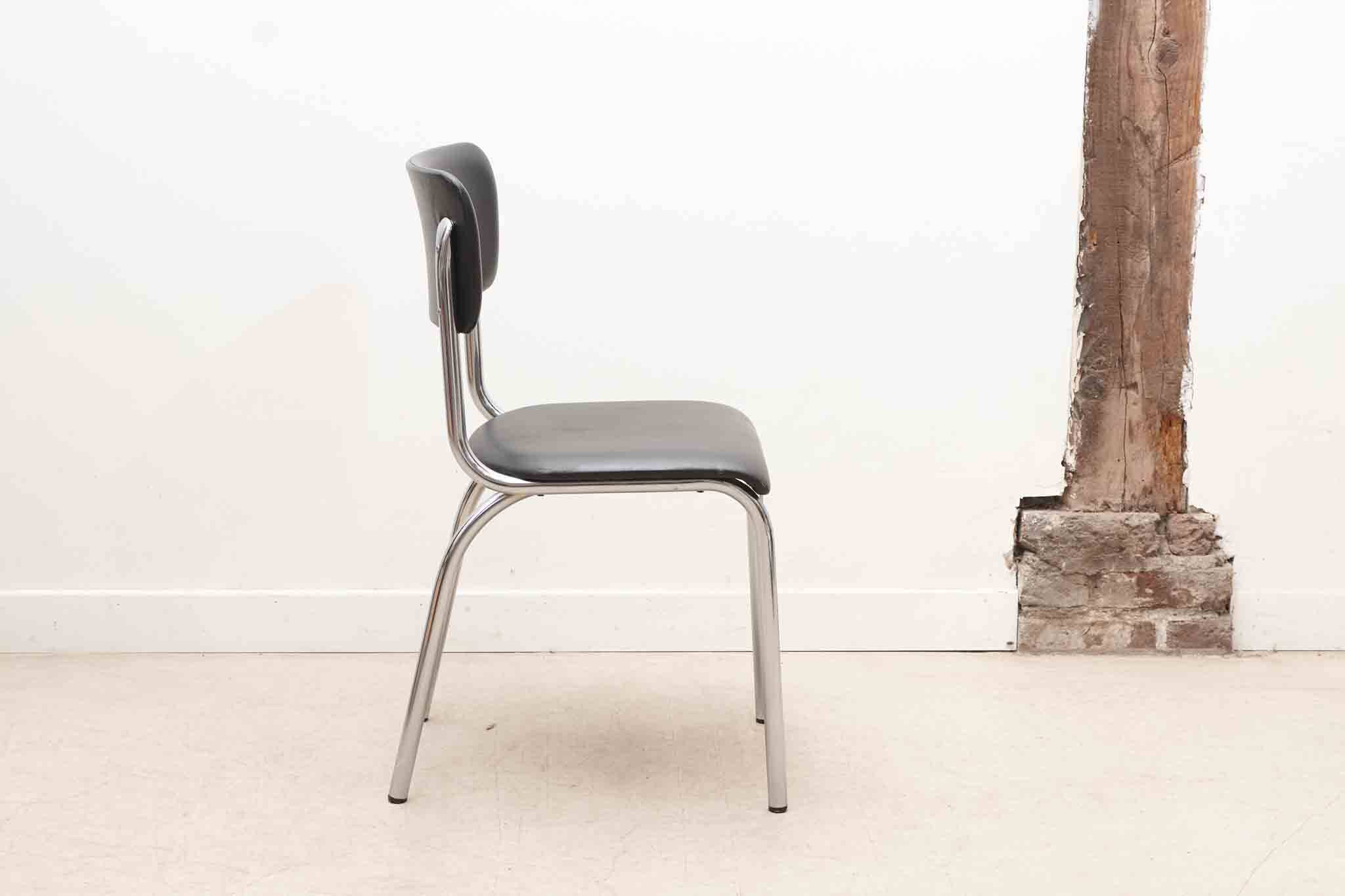 Chaise vintage tubax skaï noir et chrome