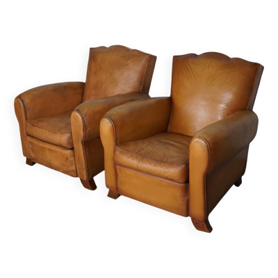 Paire de fauteuils club en cuir à dossier moustache cognac français, années 1950