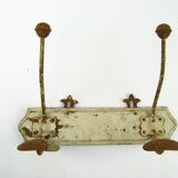 Double patere with "fleur de lys" support
