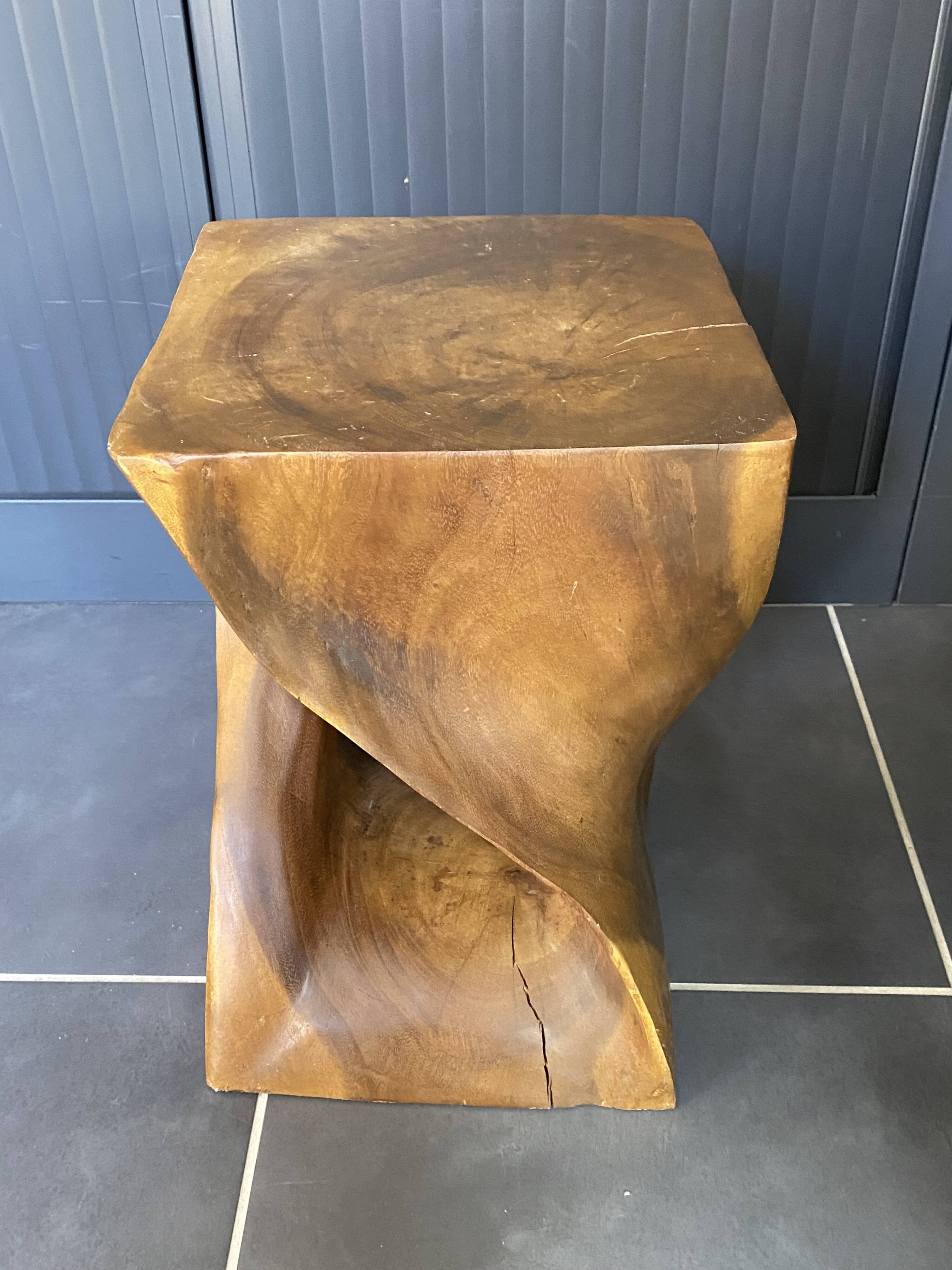 Stool no. 1 in solid raw walnut wood, carved from the mass, 1970.