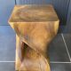 Stool no. 1 in solid raw walnut wood, carved from the mass, 1970.