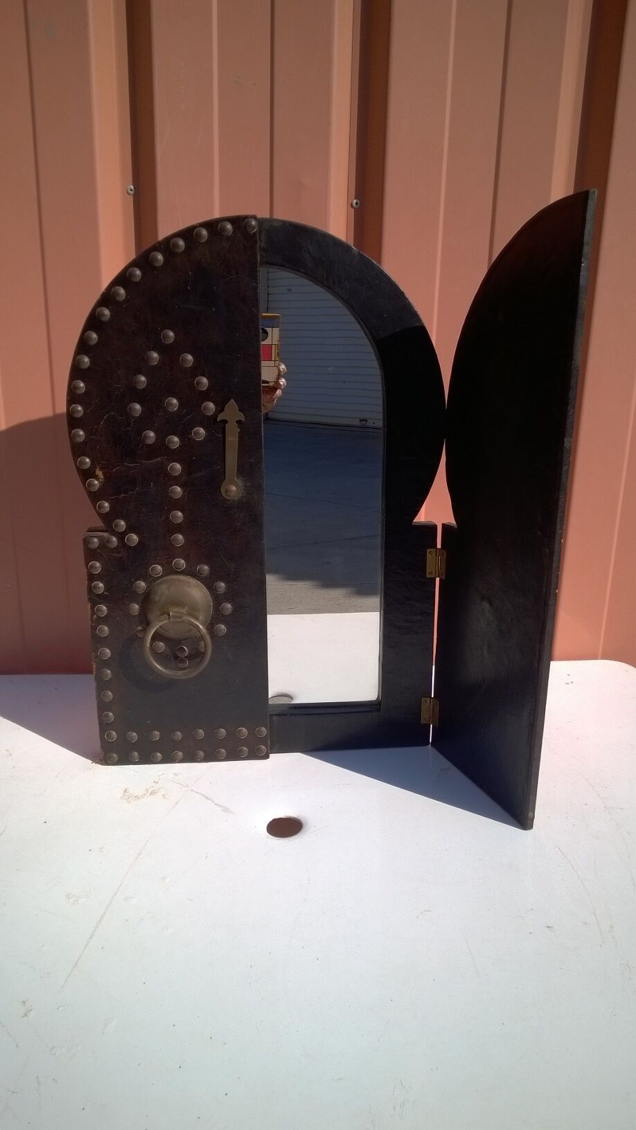 Oriental mirror leather and nails 28x55cm