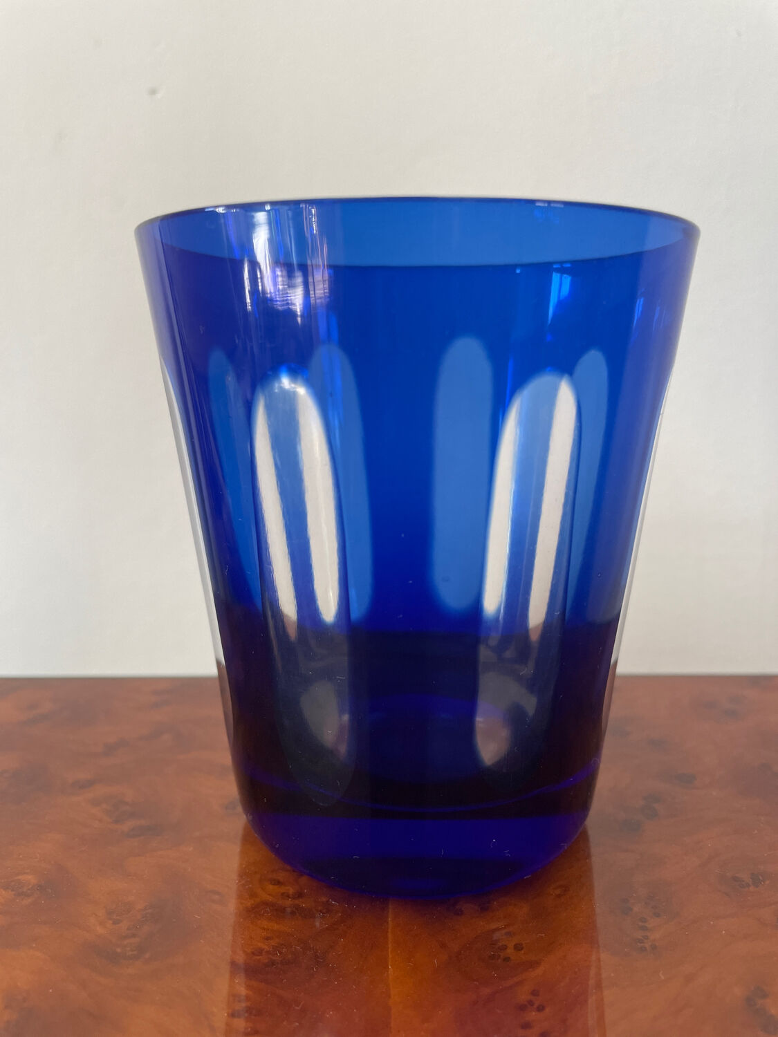 Antique crystal glass lined blue.