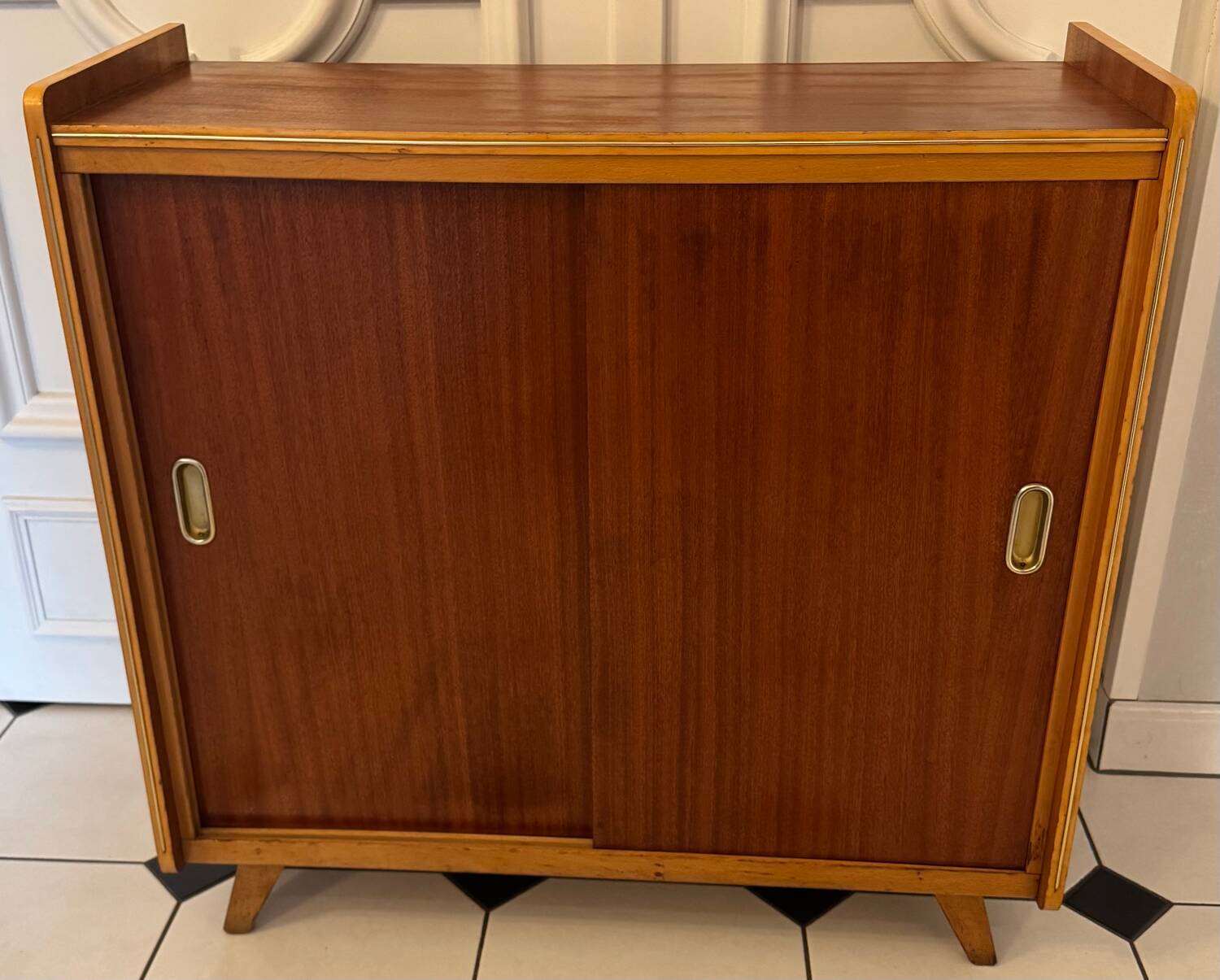 Vintage shoe cabinet with compass legs