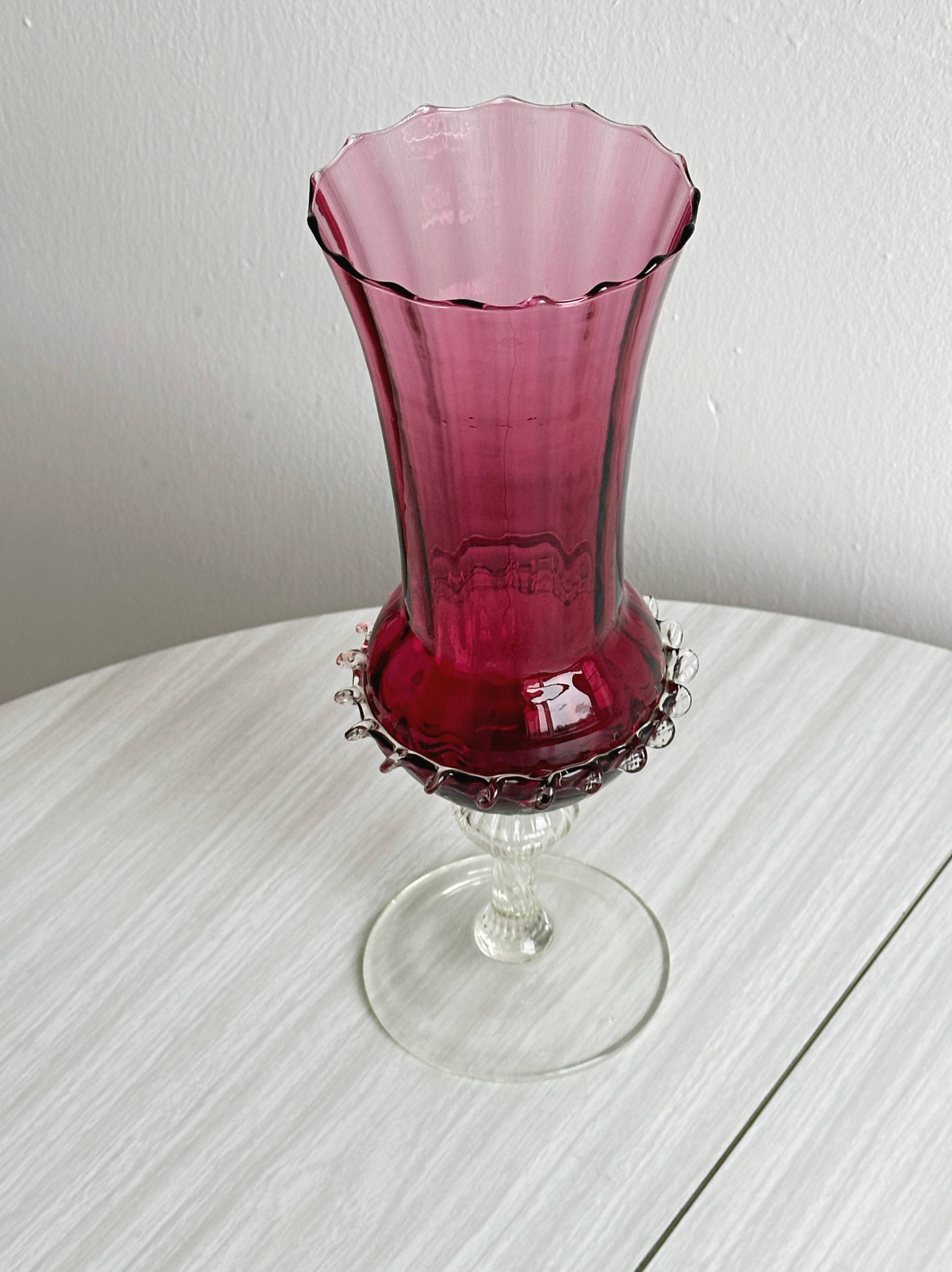 Translucent glass vase on a stand