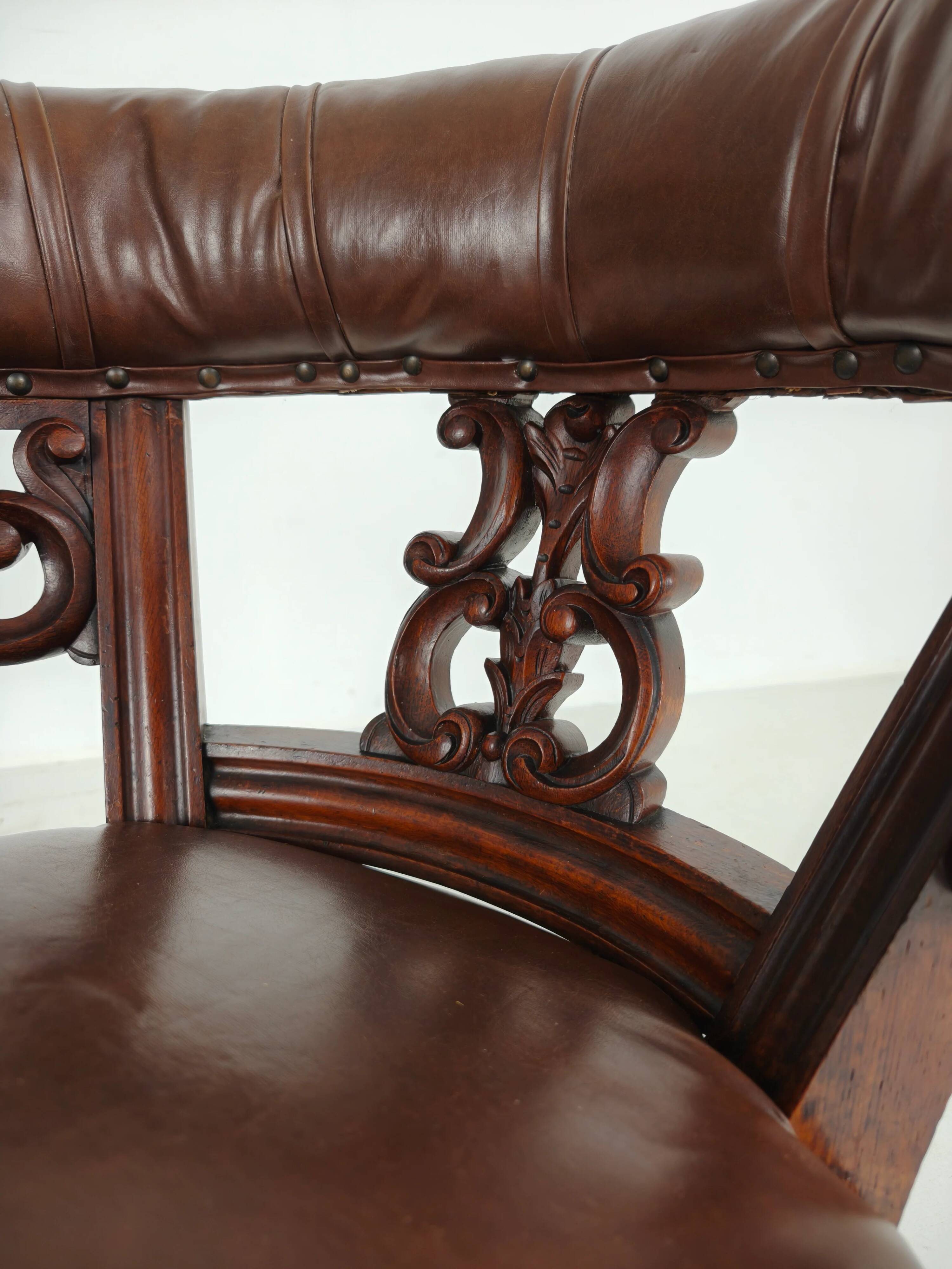 Antique leather armchair by Robson & Son – carved wood & castors, Newcastle