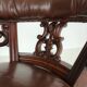 Antique leather armchair by Robson & Son – carved wood & castors, Newcastle