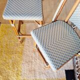 Vintage Gaty bar stools in two-tone rattan and cane.