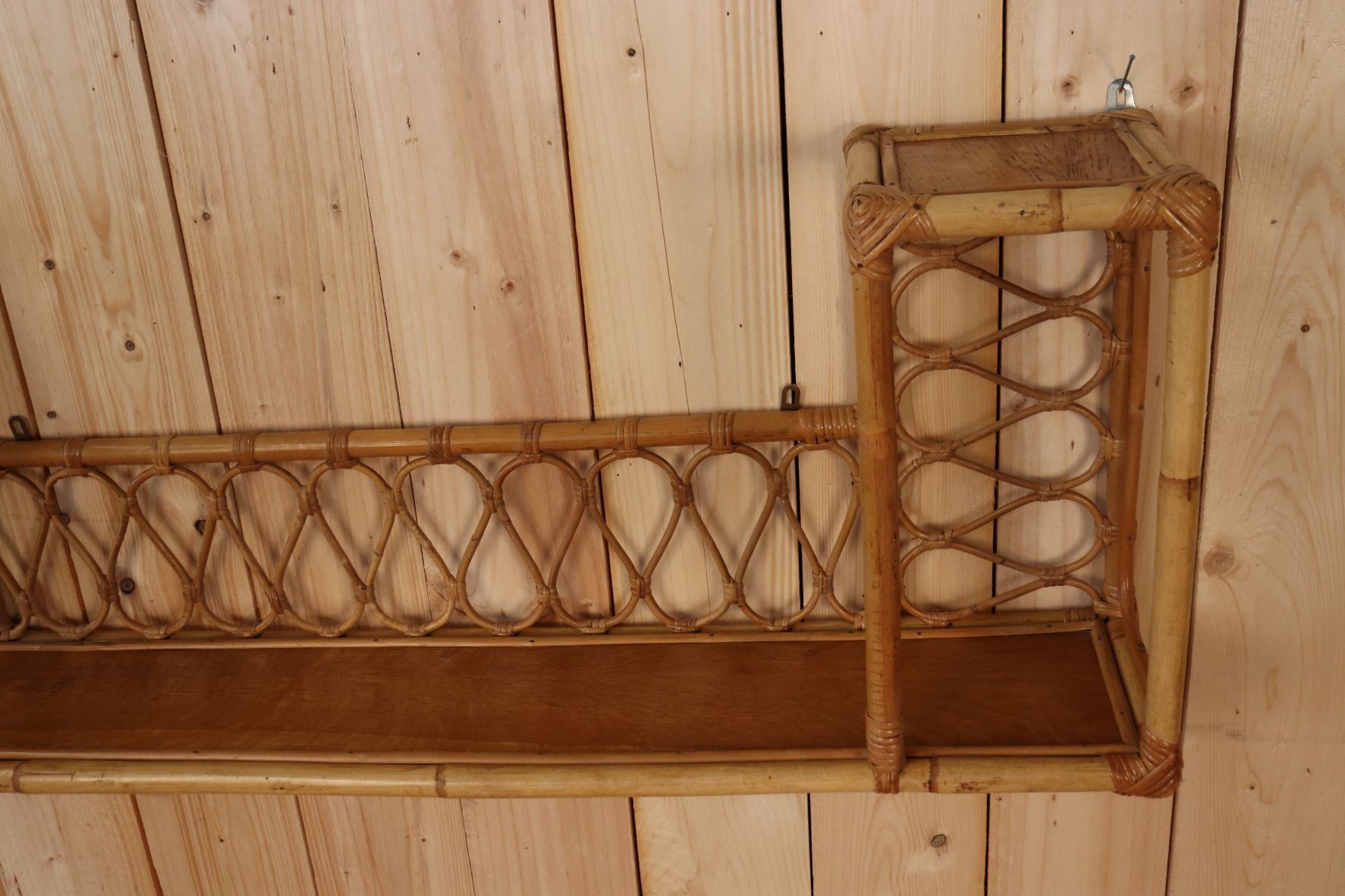 Rattan wall shelf