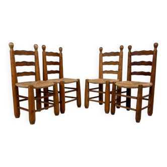 Set of 4 rush-seated chairs in the style of Charles Dudouyt.