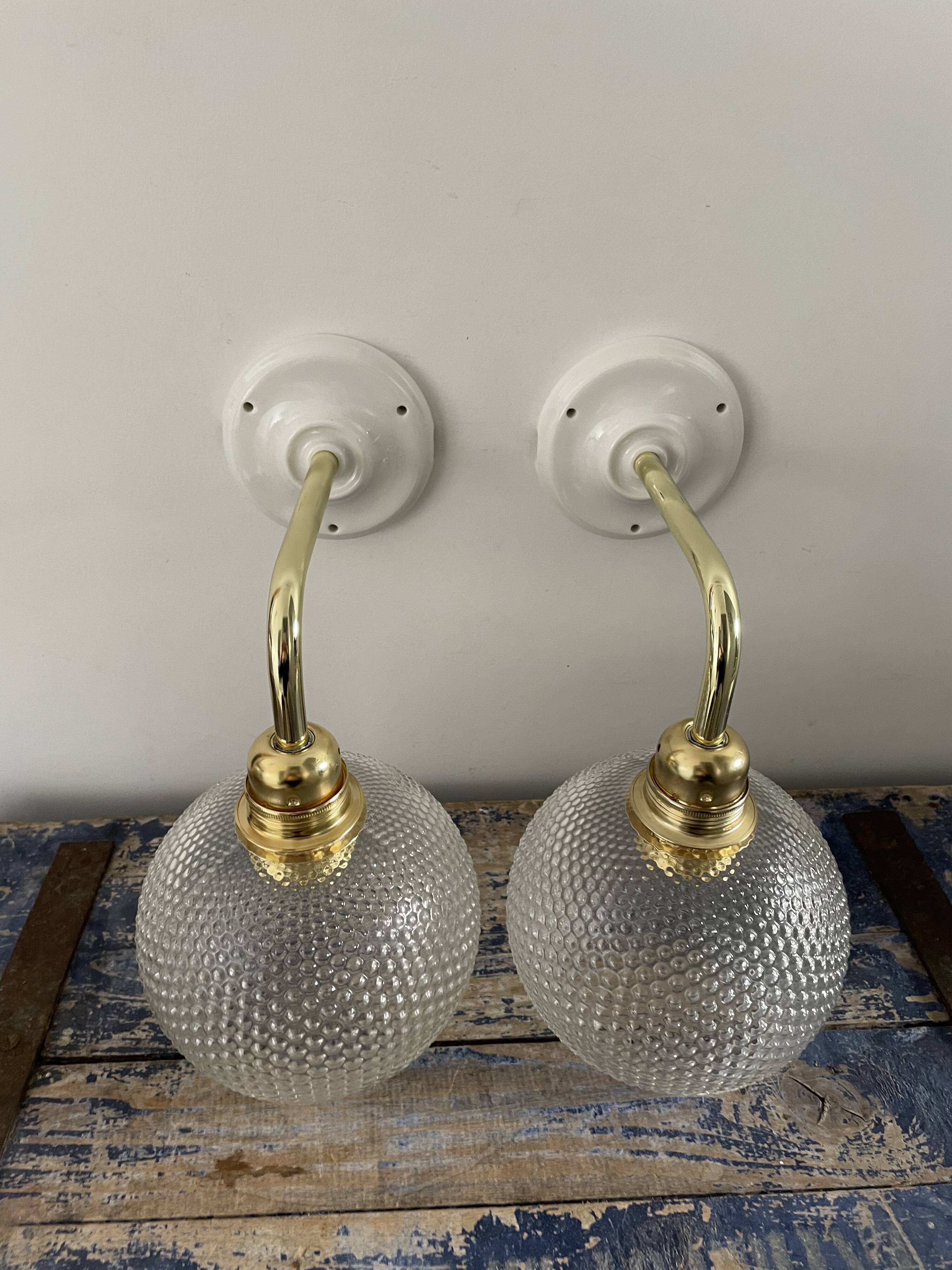 Pair of wall sconces glass globes
