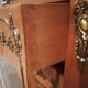 Commode galbée en loupe d'orme et bronze