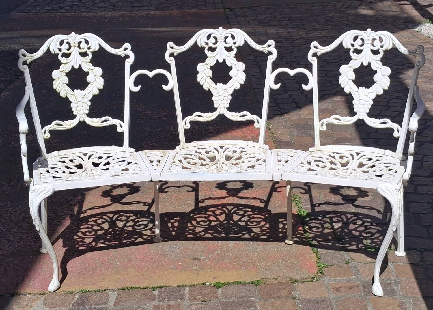Large terrace or garden bench, made of cast iron, vintage decor.