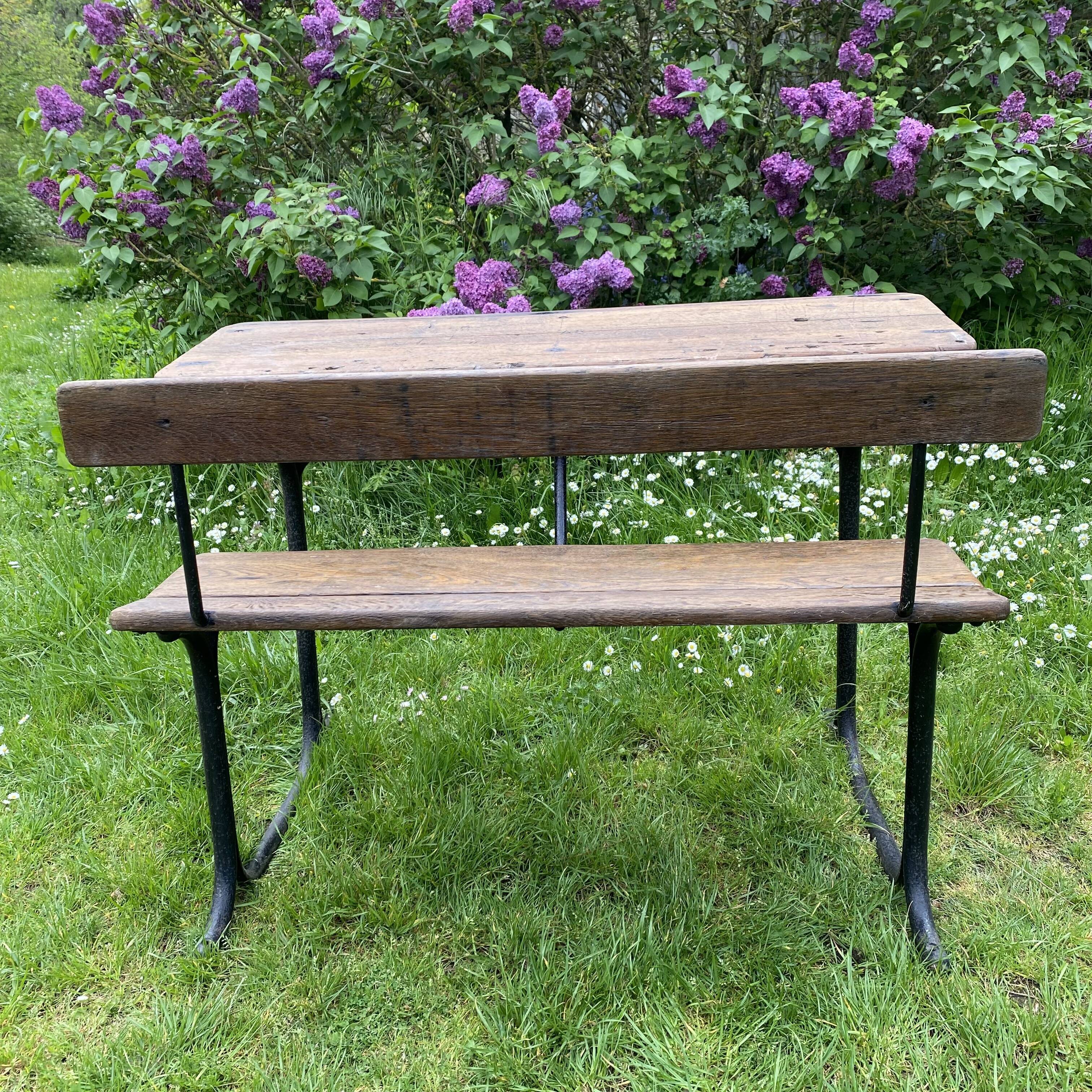 Old school desk in wood and cast iron