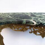 Bronze wall console and mirror.