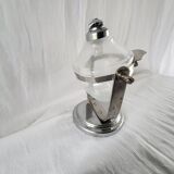 Tilting soap dispenser